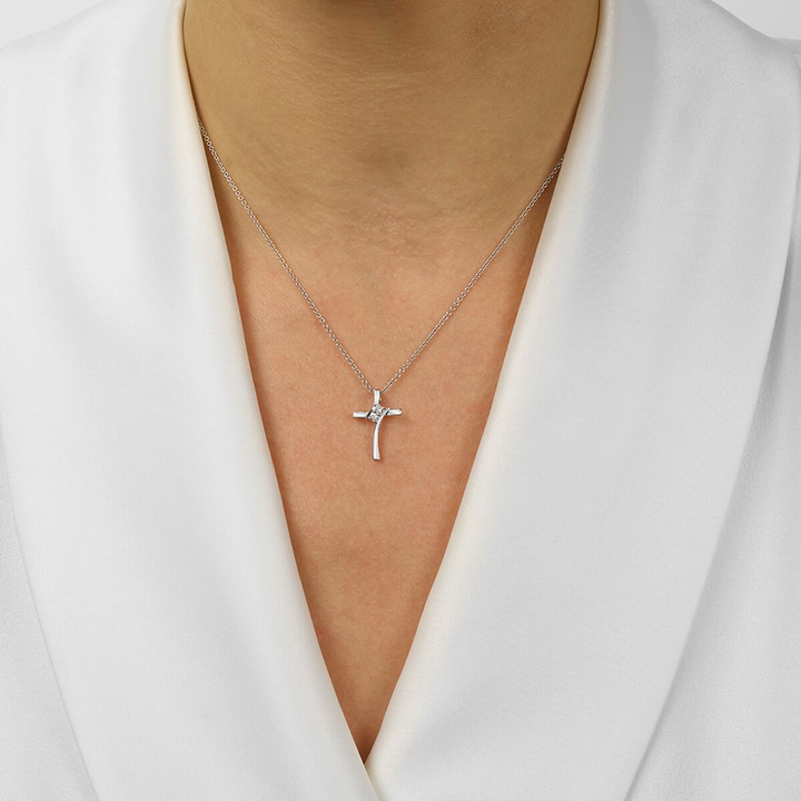 SS .05 CTW DIA CROSS 051