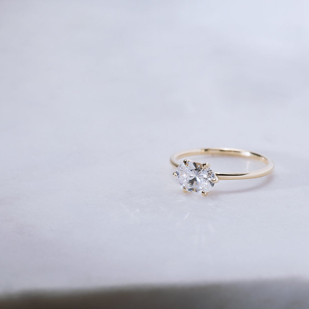 18K Gold East-West Solitaire Engagement Ring