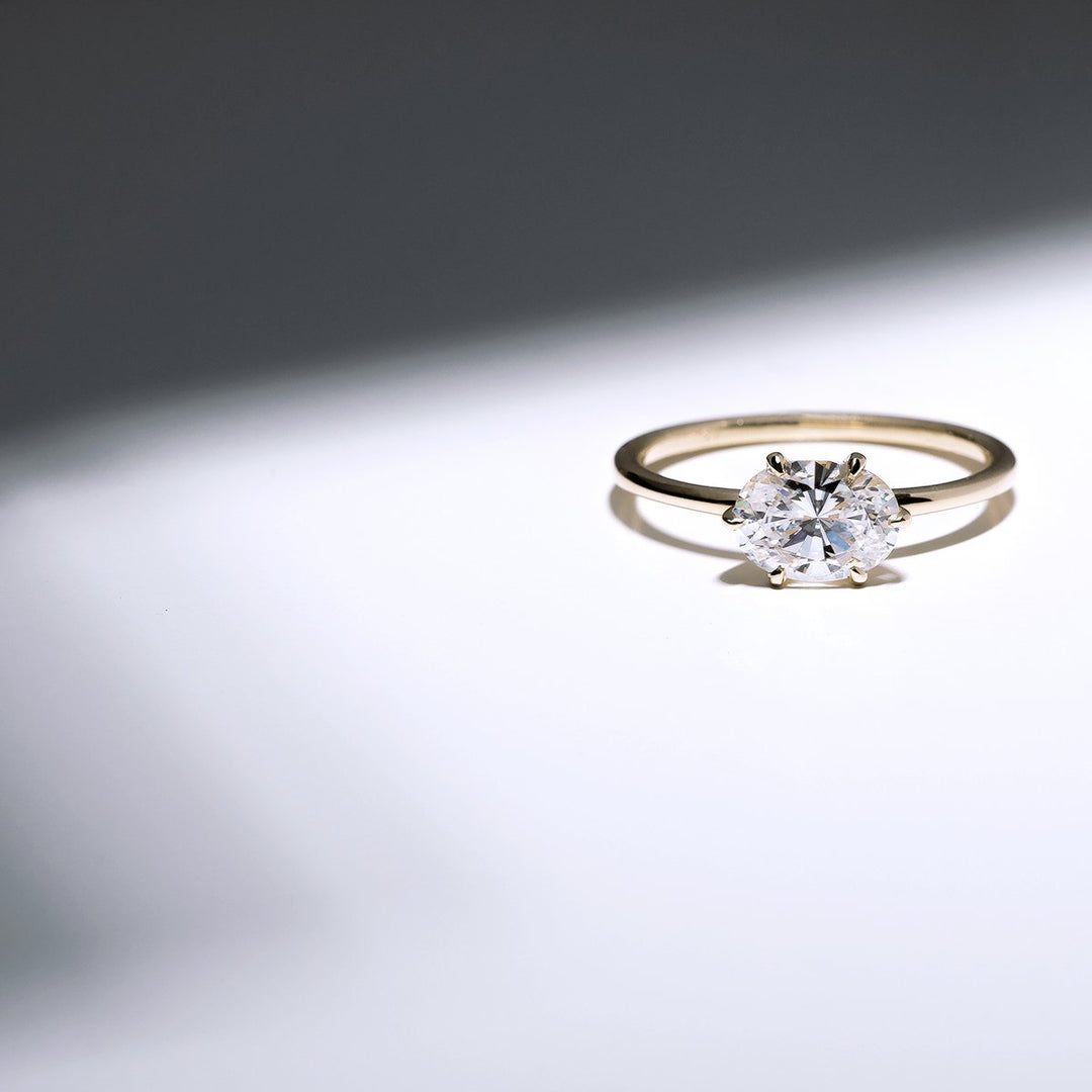 18K Gold East-West Solitaire Engagement Ring