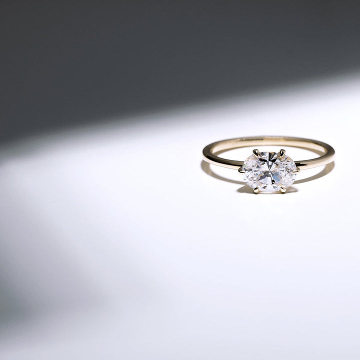 18K Gold East-West Solitaire Engagement Ring