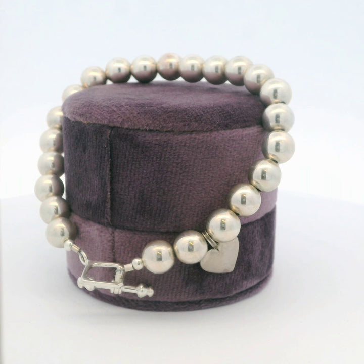 Sterling Silver Bead Bracelet With Heart Charm