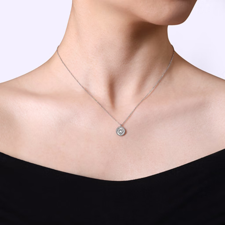 SS .06 CTW DIA HEART PEND. 003