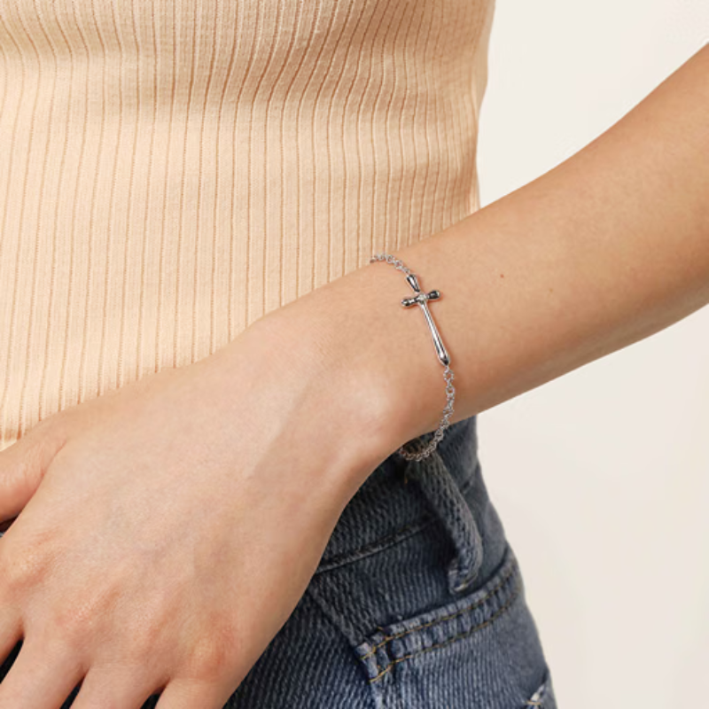 SS .02 CTW DIA CROSS BRAC. 003