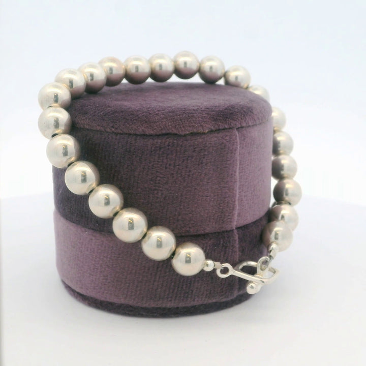 Sterling Silver Bead Bracelet With Heart Charm