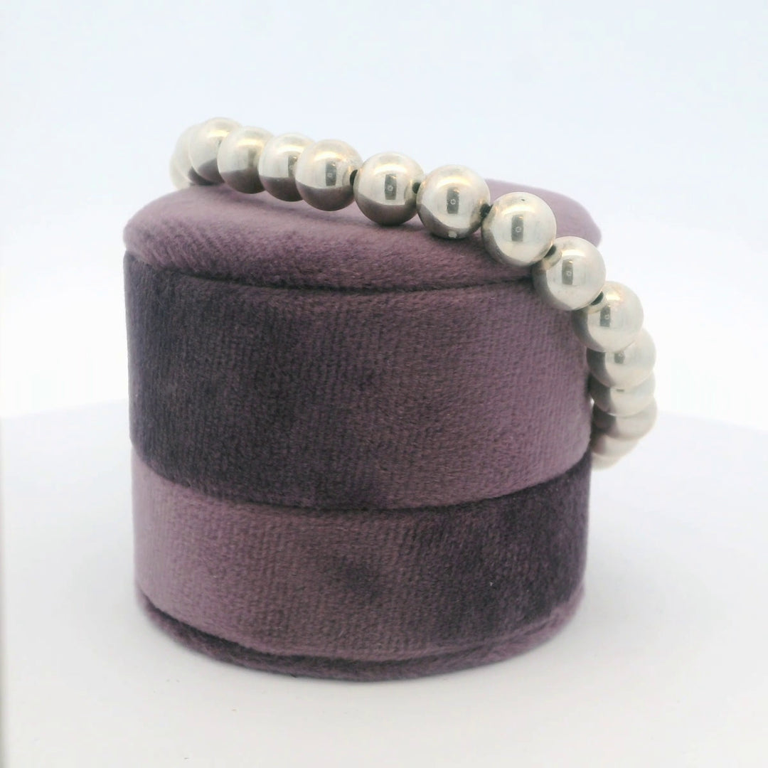 Sterling Silver Bead Bracelet With Heart Charm