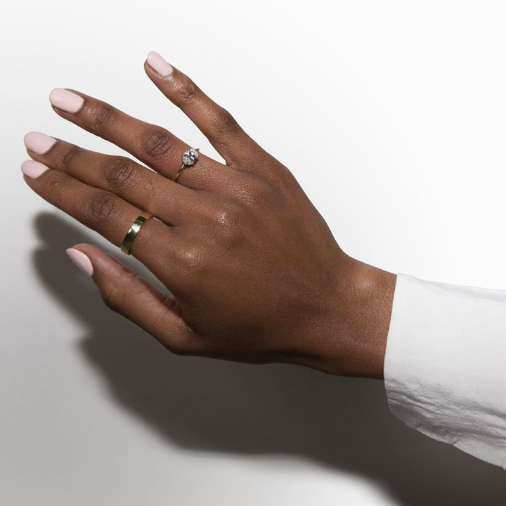 18K Gold East-West Solitaire Engagement Ring