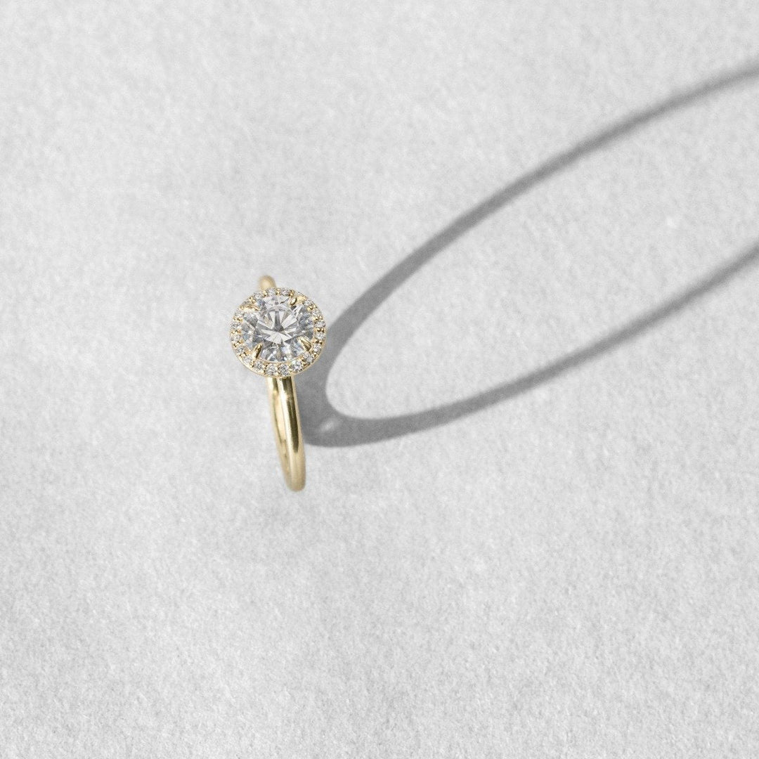 18k Gold Solitaire Halo Engagement Ring