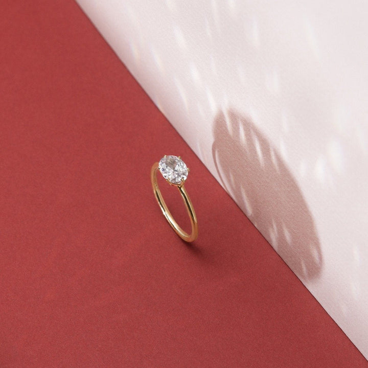 18K Gold East-West Solitaire Engagement Ring
